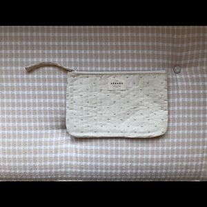 Sezane fabric clutch